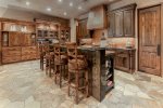Gourmet kitchen with Dacor and Sub Zero appliances plus walk-in pantry